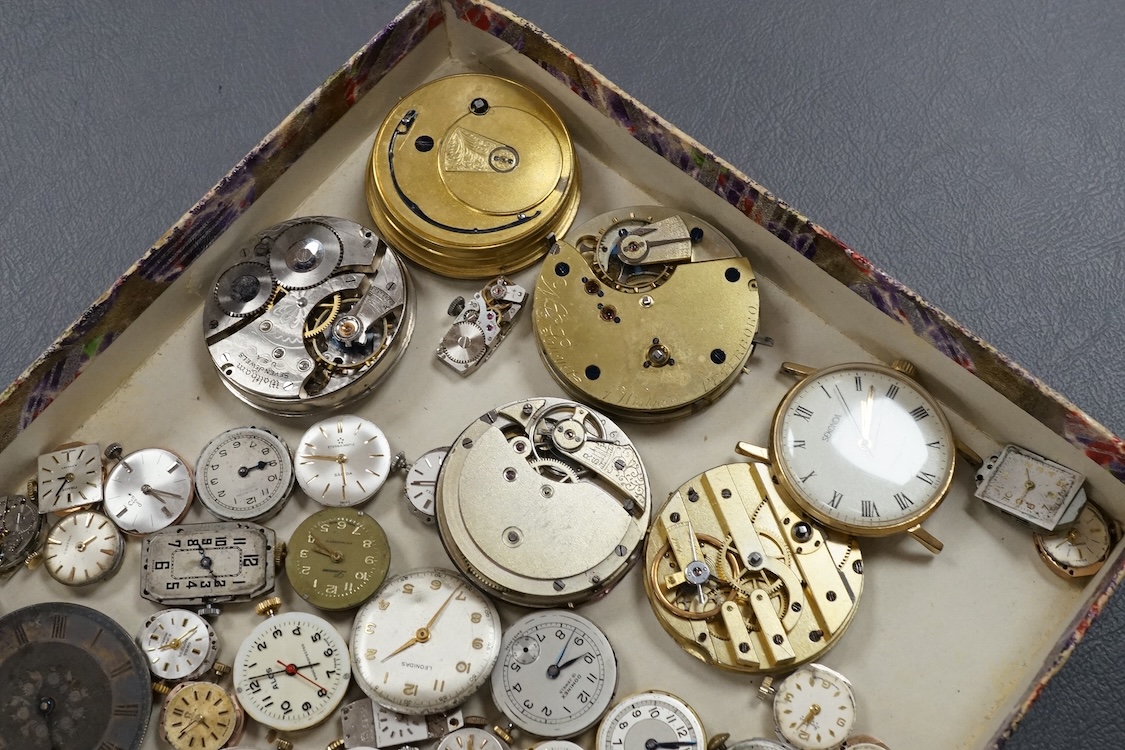 A quantity of assorted wrist and pocket watch movements, including Omega and Omega automatic, together with a pocket watch and a 935 white metal fob watch.